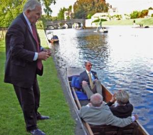 President David Adamson preparing to take the RIBI President David Fowler punting from Kings College